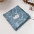 Detail of blue floral cotton scarf featuring delicate lace edges and white daisy patterns - 70x70cm / Vine Floral Blue