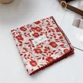Detail of red floral cotton scarf showing handmade crochet lace trim and quality texture - Floral Red