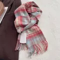 Detail of 100% wool scarf featuring pink and blue plaid pattern with fringe edges - 180x30cm / Raspberry Pink