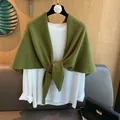 Detail of green 100% wool knit shawl tied over white shirt for autumn winter styling - Mustard Green