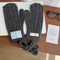 Detail of dark grey knit mittens featuring vertical textures and neck cord for winter - Cable Knit Neck Strap Style / Korean Gray