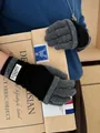 Detail showing high-quality black and grey knitted touch screen gloves with brand label - Black and Gray