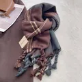 Detail shot of heavy plaid scarf with thick tassels and clear knit texture pattern - Vintage Green