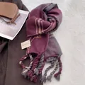 Detail of soft purple plaid scarf with thick twisted tassels and premium texture - Burgundy