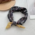 Detailed view of navy blue cotton linen scarf with floral paisley patterns and yellow border - Yellow Edge