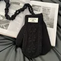 Détail de mitaines en tricot noir avec texture en laine mélangée et motifs tissés - Noir Polyvalent