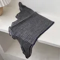 Detail of plaid cotton-linen headscarf showing fine overlock edges and fabric texture - Small Grid Navy