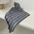 Detailed view of blue striped linen scarf featuring delicate lettuce edge and wavy trim - Two Striped