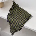 Close-up of black and green plaid silk scarf with delicate lettuce edge detailing - Big Plaid Yellow