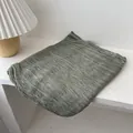 Detailed view of the olive green pleated cotton linen scarf with soft texture - Army Green