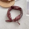 Close-up of vintage burgundy paisley silk scarf with detailed stitching and pattern - Coffee Paisley Patchwork / Coffee