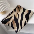 Elegant zebra pattern winter scarf for women in warm beige and black plush fabric - 180x60cm / Camel