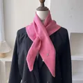 Pink knit wool triangle scarf worn as a shawl on a black blazer with a metal logo - 100*30cm / Pink