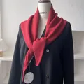 Detail of red knitted shawl scarf showing thick texture and fine knitting craftsmanship - 100*30cm / Red