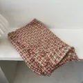 Classic red brown plaid knit scarf with fringed edges on a minimalist white stone surface - Orange / 180*90CM