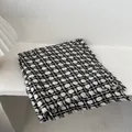 Detail of knit plaid scarf with frayed edges in black, white and brown tones - Black / 180*90CM