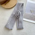 Macro view of light grey knit floral silk scarf with textured honeycomb hand-made weave - 3D Rose Flower Style / Light Gray