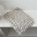 Detail of beige and taupe plaid knit scarf featuring natural frayed fringe edges - Off White / 180*90CM