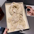 Beige cotton linen scarf with gold heart print and fringe in a black gift box - 180x60cm / Khaki