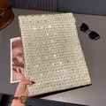 Detailed view of light gray scarf with golden heart prints on a rose gold tray - 180x60cm / Green