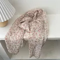 Detail of floral chiffon scarf with pleated texture and vintage red flower patterns - Pink