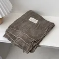 Detail of dark brown knit cotton linen scarf with ribbed texture and woven label - 180*70cm / Mocha