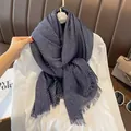 Macro detail of navy pleated scarf featuring gold shimmer texture and fringe edges - 180*90CM / Navy Blue