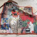 Artistic silk square scarf with floral persimmon print and orange rolled edges on lace - Persimmon