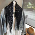 Elegant black hollow floral lace triangular shawl draped over denim jacket and white dress - 30x126cm / Flower Black