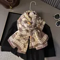 Écharpe élégante imprimée en mélange lin-soie tons marron et orange pour le printemps - café