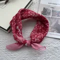 Red paisley cotton bandana for women with vintage floral pattern and elegant knotted style - 58x58cm / Red