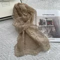 Detail of embroidered lace scarf with pearls on a light khaki sheer mesh fabric - Khaki