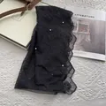 Close-up of black floral lace scarf with pearl embellishments and embroidery details - Black