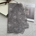 Detail of grey lace scarf with delicate floral embroidery and white pearl beads - Gray