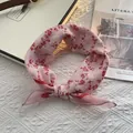 Detailed shot of soft pink floral cotton neckerchief with vintage French pattern - Pink