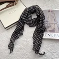 Detail of elegant black paisley chiffon scarf featuring a 3D floral rose at the edge - Paisley Black