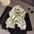 Lightweight cream shawl with green wave pattern and tassel edges for beach travel - Green