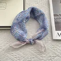 Detail of silk-texture neck scarf with blue and pink leopard print tied in a knot - 58*58cm / Blue Pink Leopard (Zebra Leopard)