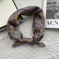 Detailed view of a vintage floral headscarf in blue-grey fabric with yellow patterns - 58*58cm / Purple Gray Flower