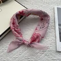 Pink floral cotton linen square scarf tied in a bow on a cozy beige background - 58x58 / Pink