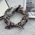 Close-up of floral cotton square scarf with ethnic paisley print and red stitched edges - 58*58cm / Red
