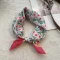 Detail view of cotton linen scarf with red tulip floral print and stitched borders - Red