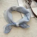 Detail of blue and white striped cotton linen square scarf tied in a stylish knot - Blue Stripe