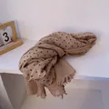 Detailed view of beige linen scarf with black polka dots and delicate fringe edges - Khaki