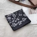 Floral paisley print cotton bandana in black and white with vintage aesthetic styling - Black Olive Branch