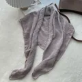 Detailed view of dusty rose pleated scarf with contrast white stitching on soft rug - 90x90cm / Taro Purple