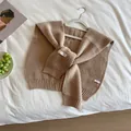 Milk tea beige waffle knit shawl wrap with Trendy logo for stylish layering outfit - Khaki