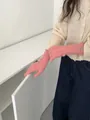 Detailed view of pink cable knit wool blend gloves with elegant ribbed cuffs and soft texture - Watermelon Pink