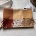 Macro shot of 100% wool scarf featuring caramel plaid pattern and long tassels - 180x30cm / Ankara Red Beige Khaki