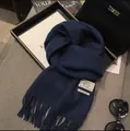 Dark blue 100% wool scarf featuring classic tassels and a woven label for winter warmth - 180*30cm / Navy Blue